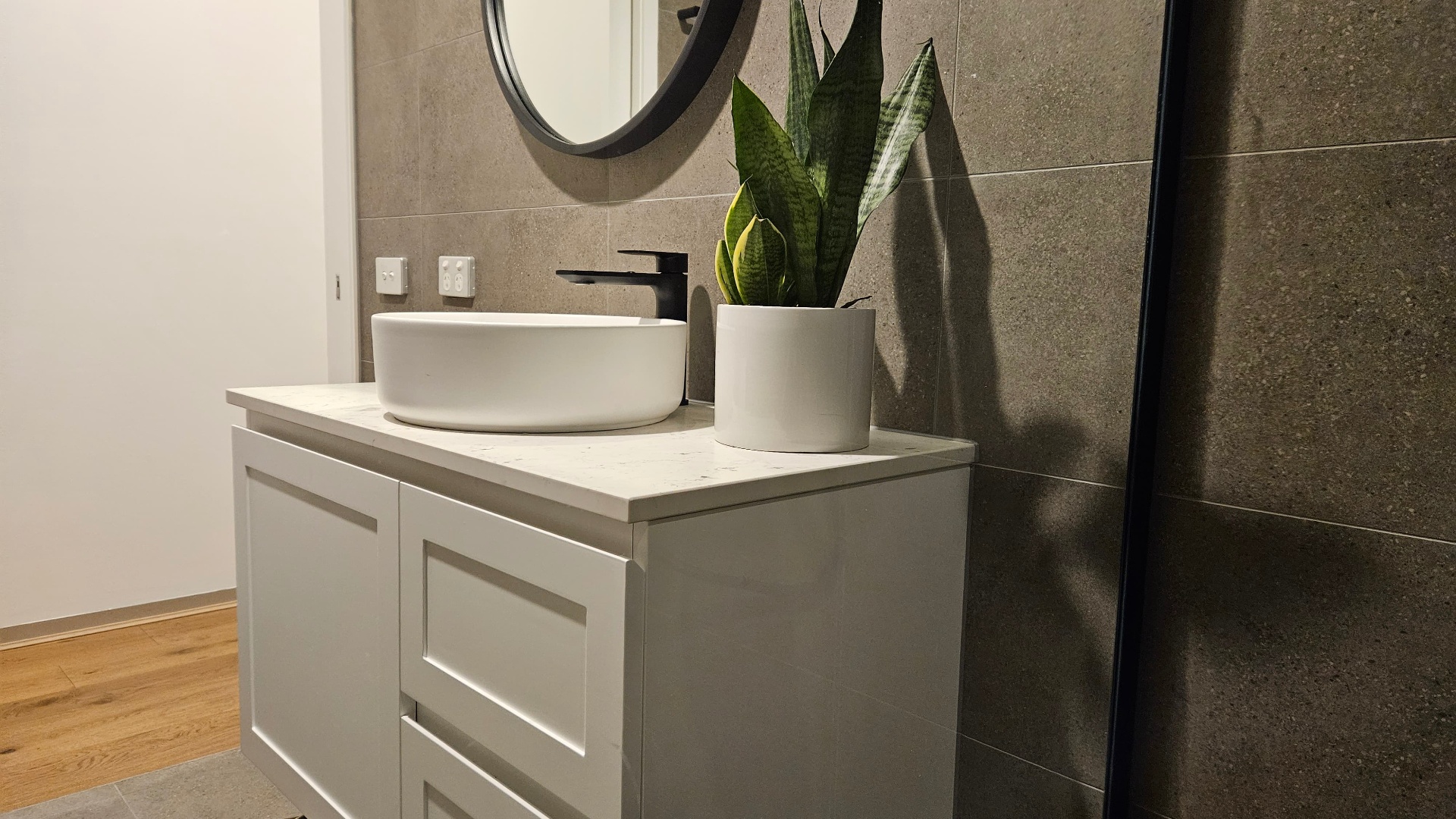 Shaker vanity with stone benchtop, vessel basin & matte black tapware
